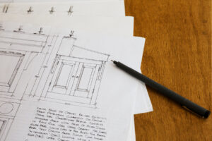 close-up-of-design-drawings-for-a-cabinet-handwri-2022-03-04-02-06-27-utc (1)